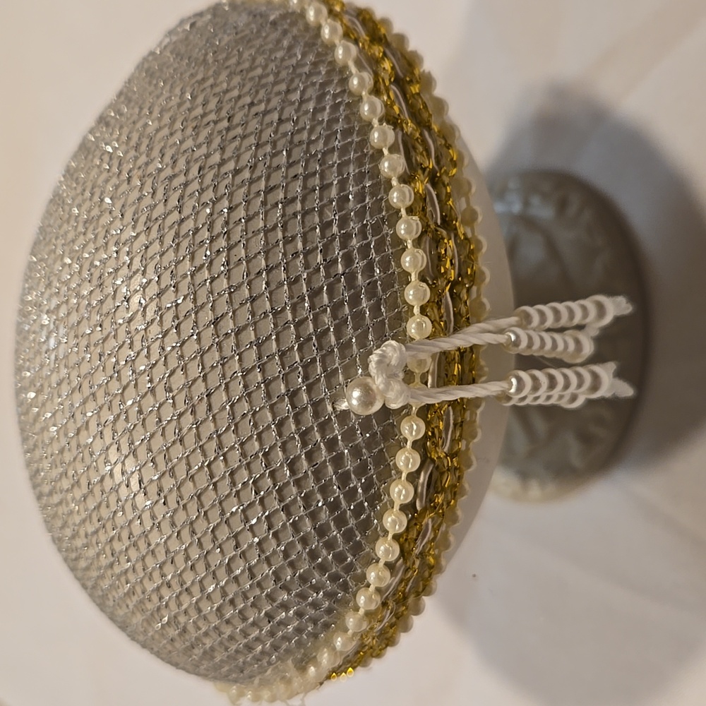 Decorative Angel enclosed in ornate egg